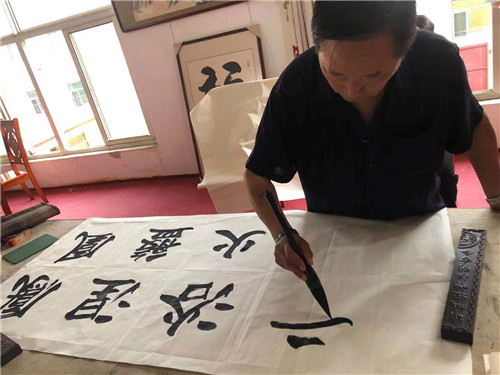 纪念唐山抗震45周年书画笔会在唐山秋丰商贸有限公司举行