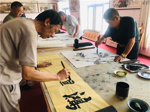 纪念唐山抗震45周年书画笔会在唐山秋丰商贸有限公司举行
