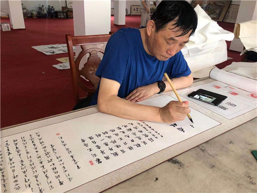 纪念唐山抗震45周年书画笔会在唐山秋丰商贸有限公司举行